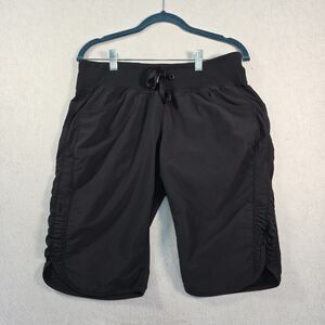 ZELLA Ruched Capri Knee length Shorts Women's Size M Yoga Pockets Black